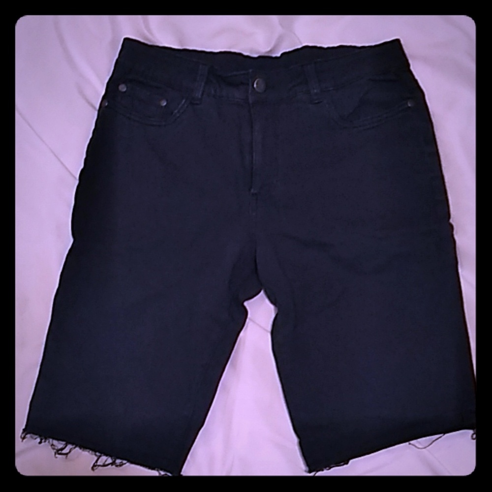 Men's size 32 cut-off denim shorts.